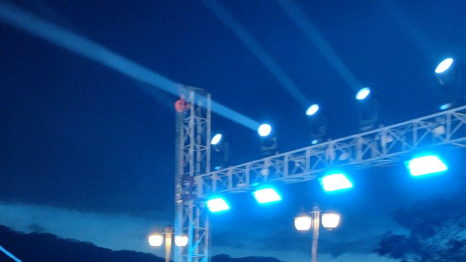 Stage truss and moving light beams